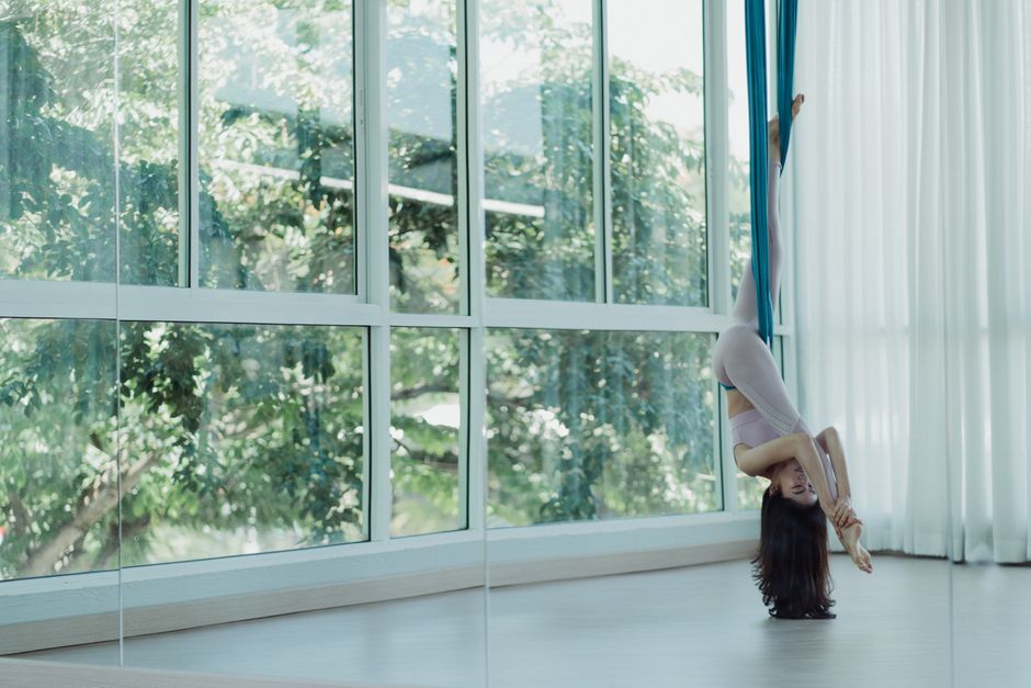 A softly lit studio arranged for restorative practice